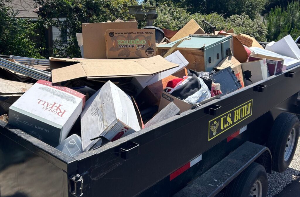 A Hauling 24/7 professional hauling unwanted household items, demonstrating the ease of expert junk removal in Montecito, CA.